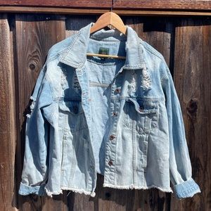 Distressed jean jacket